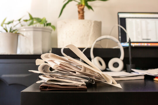 Messy workplace with receipts