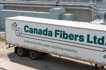 Fototapeta premium Canada Fibers Ltd transportation truck parked near Irving Tissue warehouse located at 1339 Jane Street in Toronto, Canada