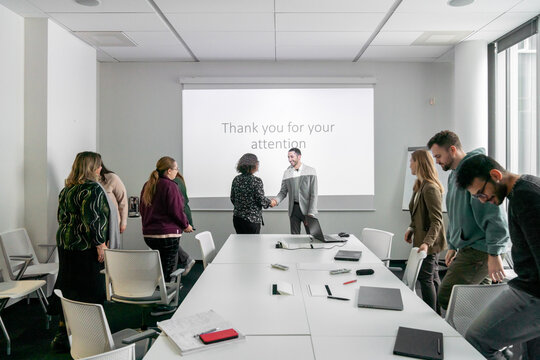 Successful Presentation. Listener Shaking Hand Of Speaker.