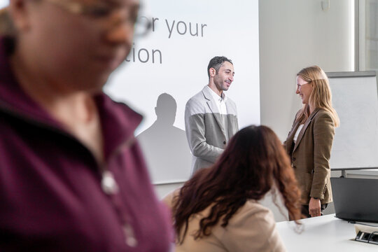 People Conversation After Successful Presentation 