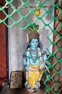 Small Hindu statue with blue skin