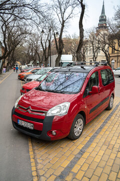 Red color Citroen Berlingo Multispace (B9) is parked in Subotica, Serbia, 22.03.2024
