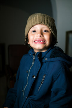 Portrait of a child without two front teeth