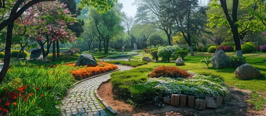 Fototapeten Lovely park garden during the spring season. © Vusal