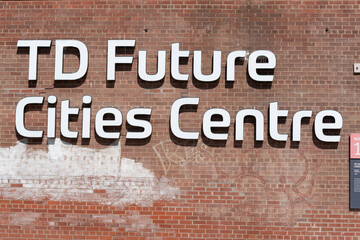 Fototapeta premium exterior wall and sign of TD Future Cities Centre, an exhibition and trade centre, located at 550 Bayview Avenue in Toronto, Canada (Evergreen Brick Works)