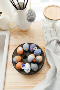 Top view Easter eggs painted with natural dyes.