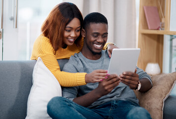 Black couple, tablet and online with digital app in home for streaming entertainment, movie or...