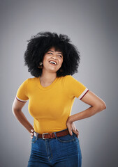 Woman, tshirt and smile of fashion, clothes and stylish with confidence of girl. Afro, happiness and female person in dark background, pride and hair for model, cool and trendy, cheerful and studio