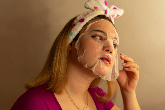 young woman with an acne treatment  Facial Mask
