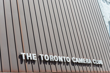 Fototapeta premium exterior building and sign of Toronto Camera Club, a non-profit organization, located at 587 Mount Pleasant Road
