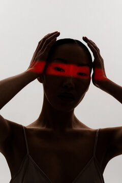 Beauty conceptual portrait in low key lighting 