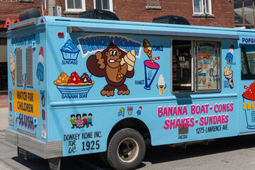 Fototapeta premium Donkey Kone Inc colorful ice cream truck on a street off Mount Pleasant Road in Toronto, Canada
