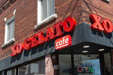 Fototapeta premium exterior building facade and sign of XO Gelato, an ice cream shop, located at 647 Mount Pleasant Road in Toronto, Canada
