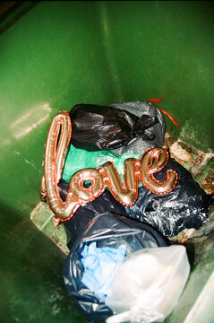 Film Photo Love Lost: Balloon in Garbage Bin