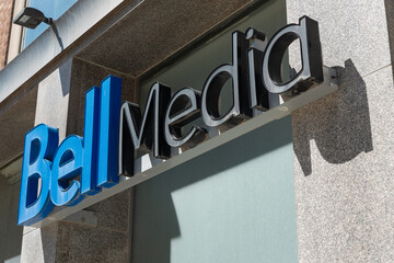 Fototapeta premium exterior building and sign close-up of Bell Media, a media company, located at 50 Eglinton Avenue East in Toronto, Canada
