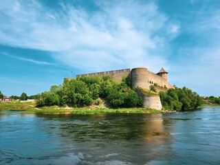 Fototapeta na wymiar Aerial Perspective of the Impressive Ivangorod Fortress, a 15th-Century Marvel of Russian Military Architecture Standing Proudly on the Banks of the Narva River in Russia