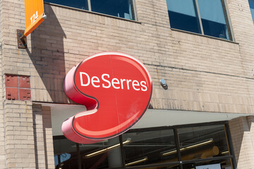 Fototapeta premium exterior building facade and logo sign of DeSerres, an art supply store chain, located here at 124 Eglinton Avenue West in Toronto, Canada