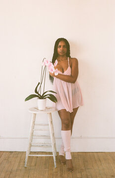 Portrait of Model and Amputee Activist with Orchid