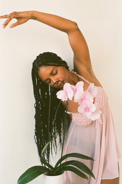 Portrait of Model and Amputee Activist with Orchid