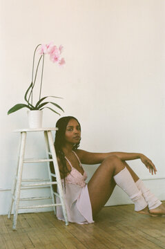 Portrait of Model and Amputee Activist with Orchid