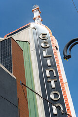 Fototapeta premium glimpse up at the projecting sign of The Eglinton Grand, an event venue, located at 400 Eglinton Avenue West in Toronto, Canada