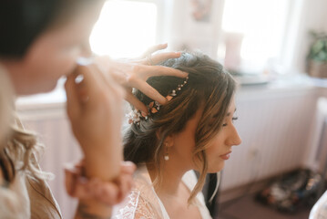 A bride having her hair done