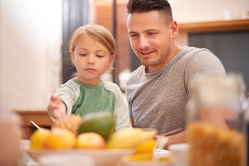 Family, father and kid eating breakfast in home together for healthy diet, nutrition or wellness in...