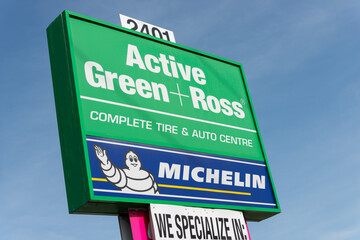 Fototapeta premium exterior sign of Active Green+Ross Tire & Automotive Centre, a car repair and maintenance service chain, located here at 2401 Eglinton Avenue West in Toronto, Canada