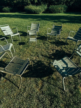 Chairs stand in a circle in the park