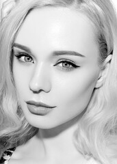 Potrait of young attractive woman with long and shiny blonde hair on white, topless. Friendly natural sescual black and white portrait. © dashamuller