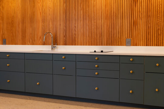Vertical Wood Paneling in Modern Home  Kitchen cabinet drawer