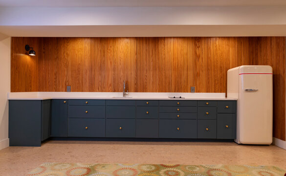 Vertical Wood Paneling in Modern Home  Kitchen nice lighting 