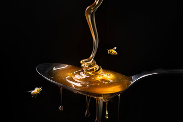 Honey dripping from spoon