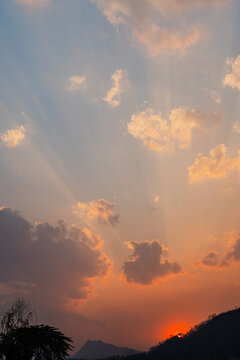Rays of light passing through the clouds at sunset 