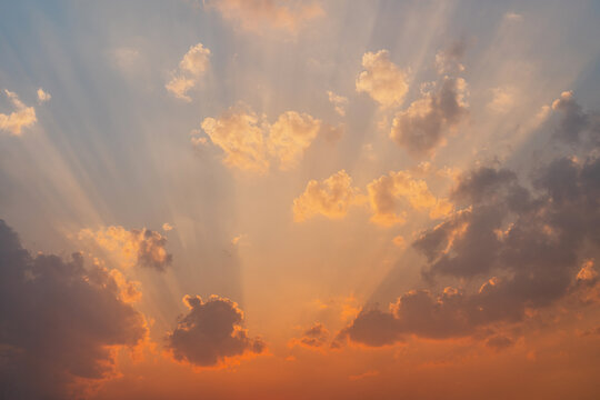 Rays of light passing through the clouds at sunset 