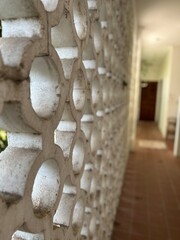 detail of textured wall windows - travel texture in Cambodia