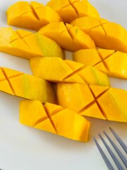 cut mango bright yellow travel texture in Cambodia