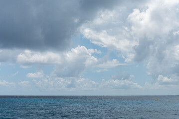 Naklejka na ściany i meble Beautiful blue sea water tide and sky