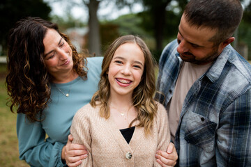Parents With Their Daughter