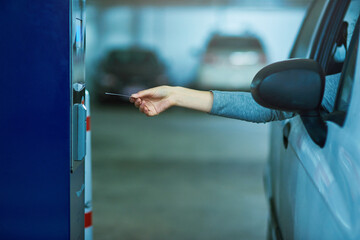 Parking lot, car and hand with ticket meter for payment, cost and access for security, safety or...