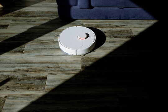 robot vacuum cleaner cleans the room