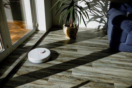 robot vacuum cleaner cleans the room