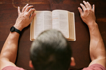 God, bible study and man top view in house for reading, learning or spiritual, knowledge and...