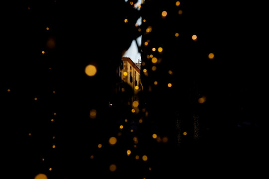 Building through blured christmas lights