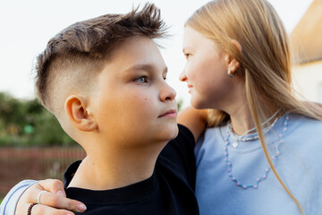 Portrait of brother and sister outdoors, siblings headshot, gen z 