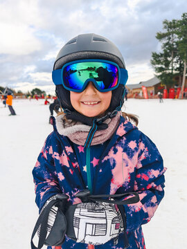 Happy Child Ready for Winter Sports Adventure, UCG travel