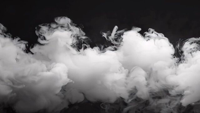 Abstract black and white smoke clouds with dynamic swirls creating fluid texture. Slow motion