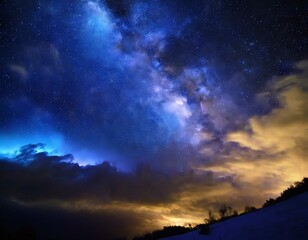 Fototapeta premium sky resembled a galaxy with numerous stars shining brightly, creating an electric blue atmosphere. Clouds formed a cumulus landscape, adding to the artistic beauty of the scene