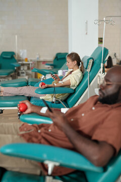Man And Woman In Blood Donation Center