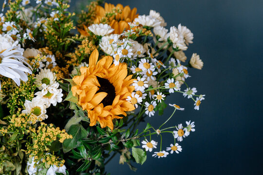 Flower bouquet on blue background.
